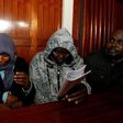 Kenyan police officers Silvia Wanjohi, Stephen Morogo and Fredrick Leliman, suspected of killing human rights lawyer Willie Kimani, his client and their driver, sit in the dock at Milimani Law courts in Nairobi, Kenya, July 4, 2016. Picture taken July ...