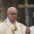 Pope Francis holding a cross