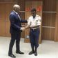 Tony Elumelu and security guard
