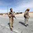 Libyan soldiers man a checkpoint in Wadi Bey, west of the Islamic State-held city of Sirte, February 23, 2016.
