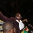 Zimbabwean Pastor Evan Mawarire is lifted by followers after his release at Harare Magistrates court, July 13, 2016.