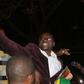 Zimbabwean Pastor Evan Mawarire is lifted by followers after his release at Harare Magistrates court, July 13, 2016.