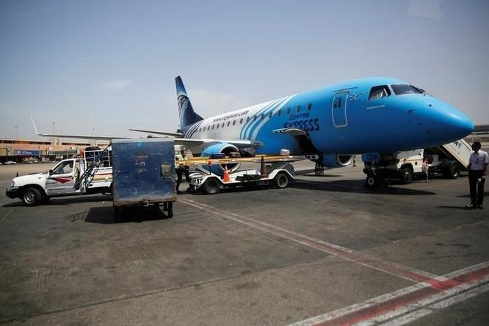 Workers service around an Egyptair flight at International Cairo Airport, Egypt May 21, 2016.