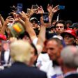 Republican U.S. presidential candidate Donald Trump signs autographs after a rally with supporters in San Diego, California, U.S. May 27, 2016.