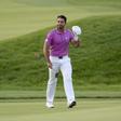 Jason Day waves to the gallery as he walks to the 18th green during the final round of the U.S. Open golf tournament at Oakmont Country Club.