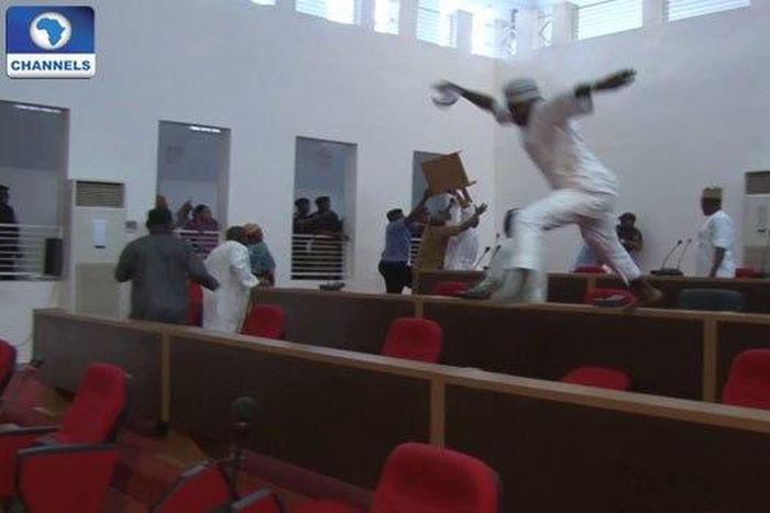 Lawmakers suspended for fighting threaten legal action.