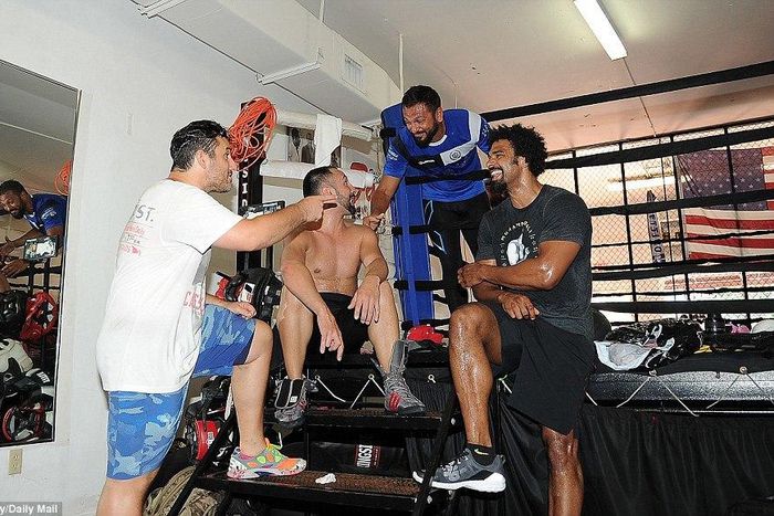 David Haye with Paulie Malignaggi, Joe Fournier and coach Dino Spencer at the 5th Street gym in Miami