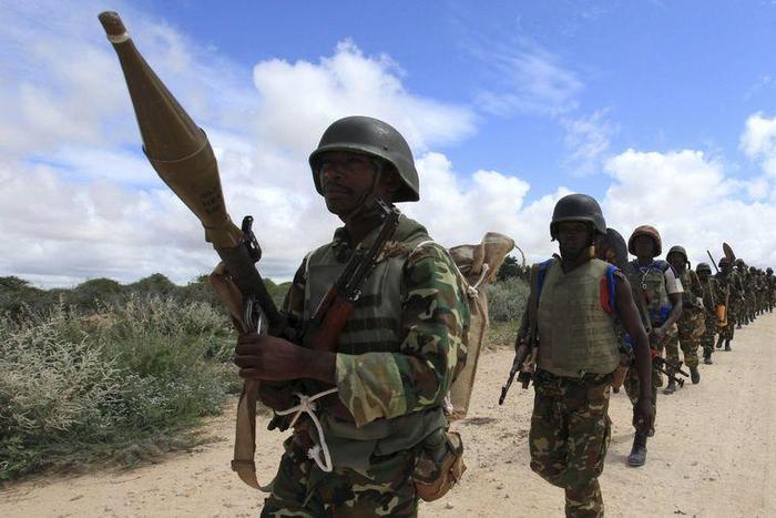 African Union Mission in Somalia (AMISOM) peacekeepers from Burundi patrol after fighting between insurgents and government soldiers erupted on the outskirts of Mogadishu in this May 22, 2012 file photo.