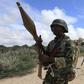 African Union Mission in Somalia (AMISOM) peacekeepers from Burundi patrol after fighting between insurgents and government soldiers erupted on the outskirts of Mogadishu in this May 22, 2012 file photo.