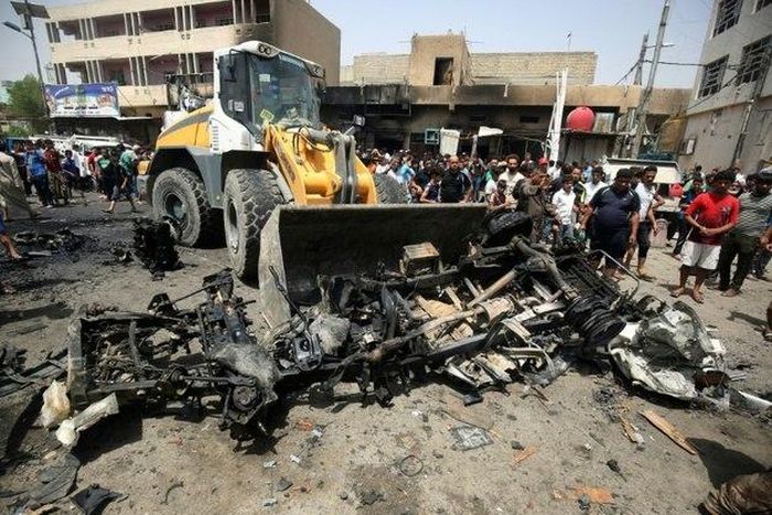 Three bombings in Baghdad kill 63 -police, medical sources