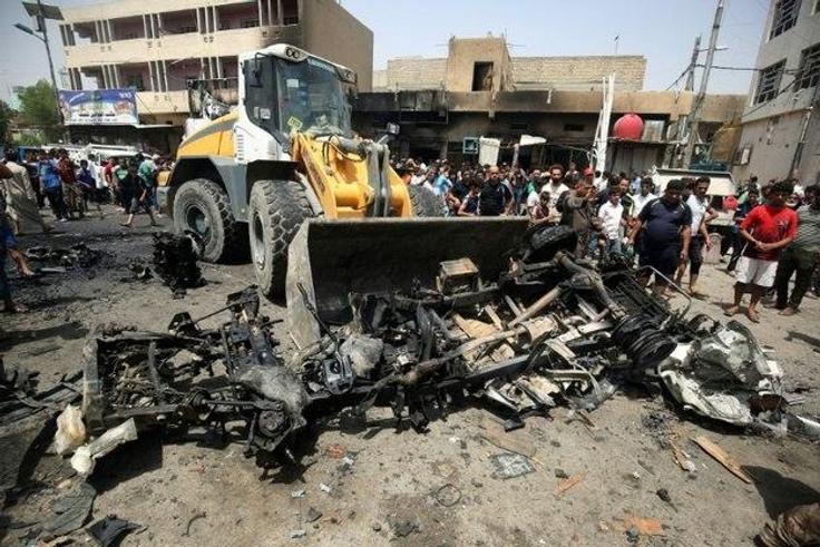 Three bombings in Baghdad kill 63 -police, medical sources