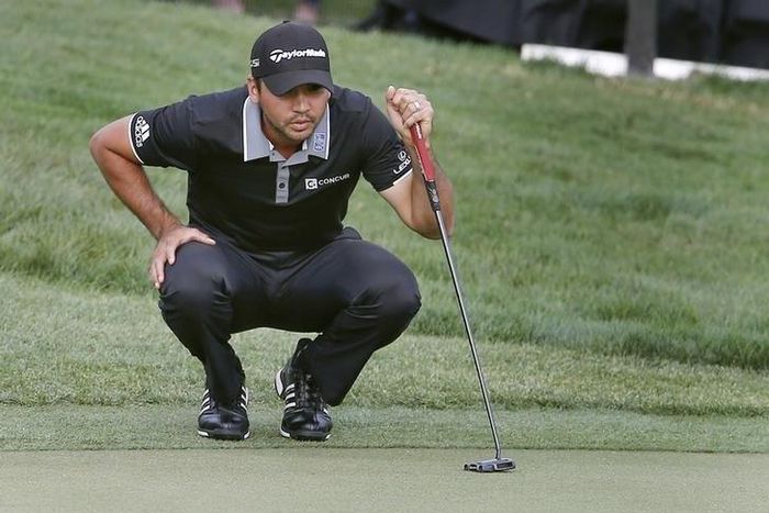 Mar 20, 2016; Orlando, FL, USA; Jason Day of Australia lines up his putt on the 18th hole during the final round of the Arnold Palmer Invitational presented by Master Card at Bay Hill Club and Lodge . Mandatory Credit: Reinhold Matay-USA TODAY Sports