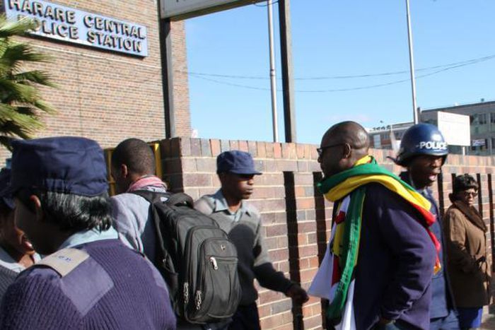 Zimbabwe charges anti-Mugabe preacher who urges protests to go on