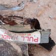 Debris is seen at the crash site of Air Algerie flight AH5017 near the northern Mali town of Gossi, July 24, 2014.  REUTERS/Burkina Faso Military/Handout via Reuters