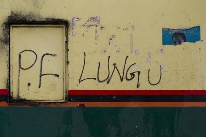 Patriotic Front (PF) Presidential candidate Edgar Lungu's name appears on a shop wall in Lusaka, January 20, 2015.