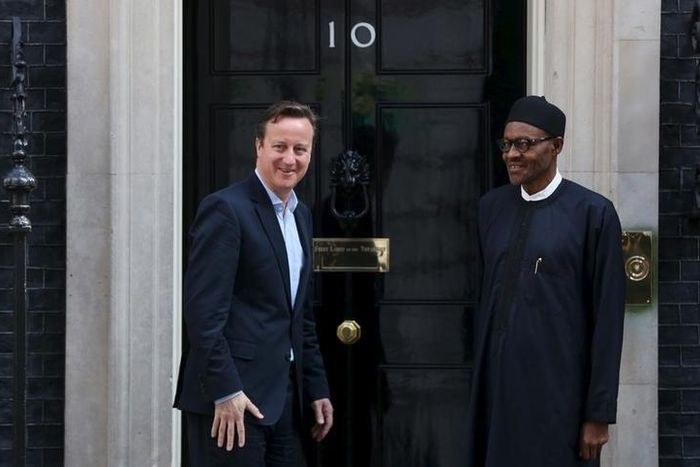 Nigeria's President-elect Muhammadu Buhari (R) departs after meeting with Britain's Prime Minister David Cameron at Downing Street in London, England, May 23, 2015. REUTERS/Neil Hall