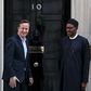 Nigeria's President-elect Muhammadu Buhari (R) departs after meeting with Britain's Prime Minister David Cameron at Downing Street in London, England, May 23, 2015. REUTERS/Neil Hall