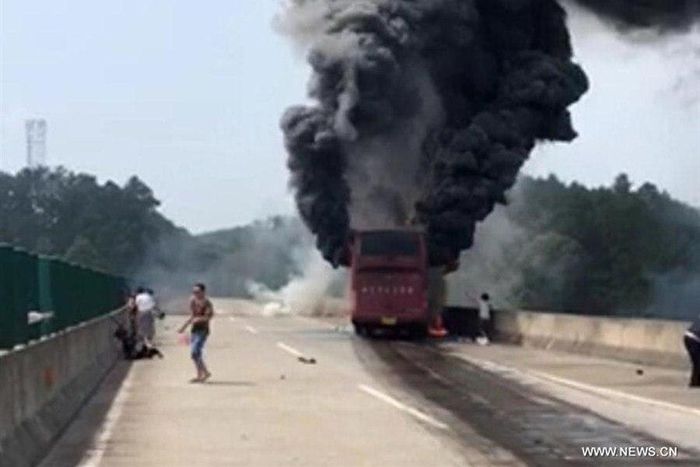 Photo provided by witness on June 26, 2016 shows the accident site of a bus fire in Yizhang County, central China's Hunan Province.