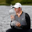 Northern Ireland's Rory McIlroy kisses the trophy after winning the Dubai Duty Free Irish Open