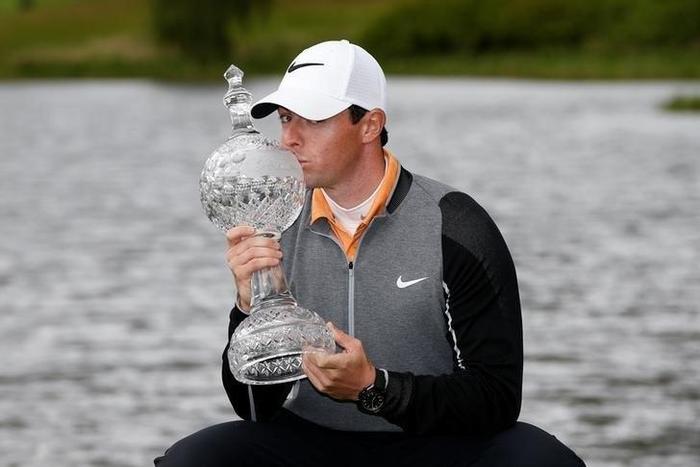 Northern Ireland's Rory McIlroy kisses the trophy after winning the Dubai Duty Free Irish Open