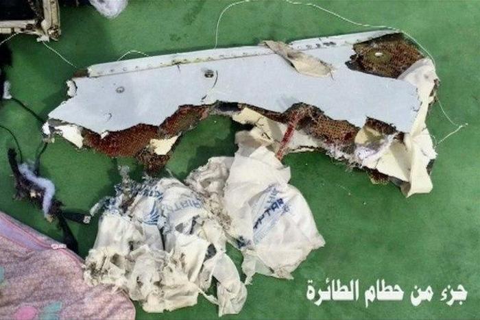 Recovered debris of the EgyptAir jet that crashed in the Mediterranean Sea is seen with the Arabic caption "part of plane wreckage" in this still image taken from video on May 21, 2016.
