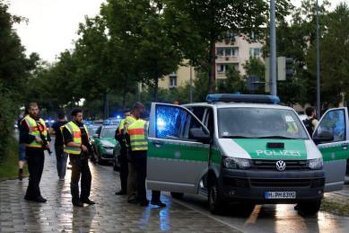 Police secure a street near to the scene of a shooting in Munich, Germany July 22, 2016.