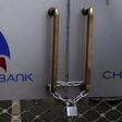 The logo of Chase Bank is seen on the closed entrance of one of its branches, after the bank was put under receivership, in Nairobi, Kenya, April 8, 2016. REUTERS/Siegfried Modola