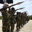Al Shabaab militants parade new recruits after arriving in Mogadishufrom their training camp south of the capital in this October 21, 2010 file photo. REUTERS/Feisal Omar/Files
