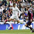 Football Soccer - Real Madrid v Eibar- Spanish Liga BBVA - Santiago Bernabeu, Madrid, Spain - 09/04/16  Real Madrid's Cristiano Ronaldo and Eibar's Ivan Ramis in action REUTERS/Andrea Comas