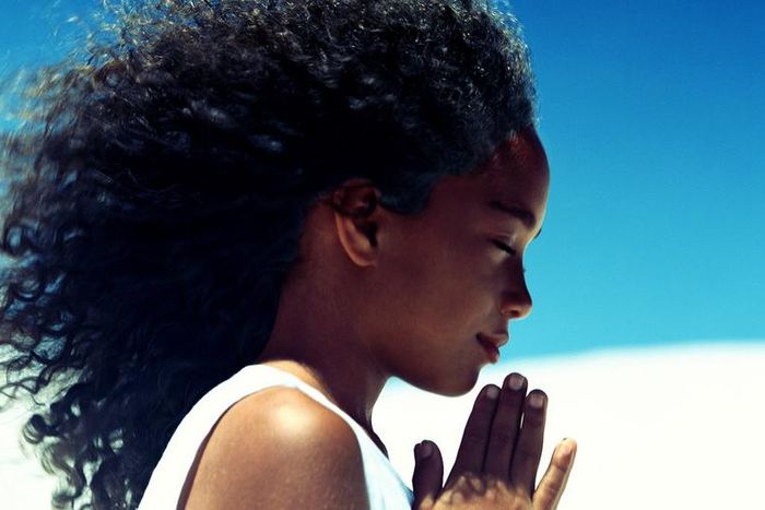 Praying black woman