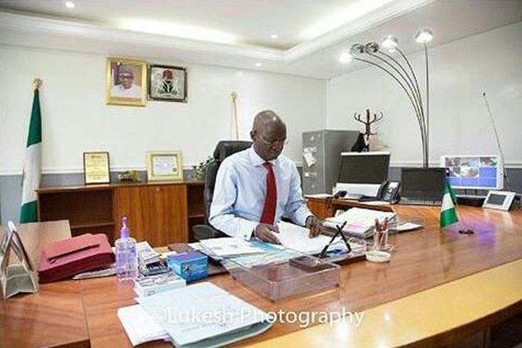 Minister of Power, Works and Housing in his office in Abuja