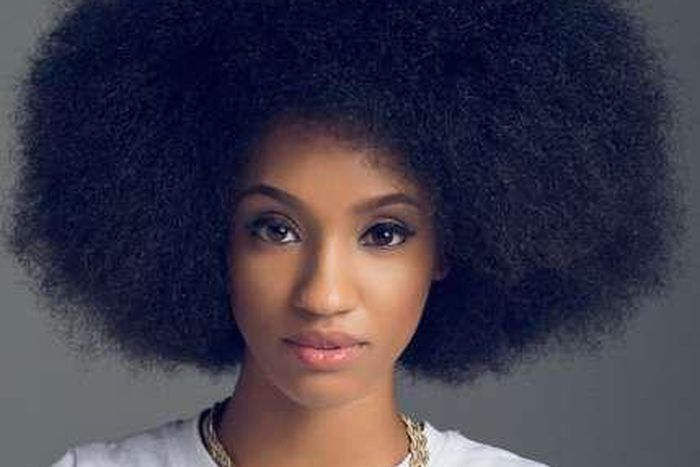 Di'Ja wears her natural hair beautifully