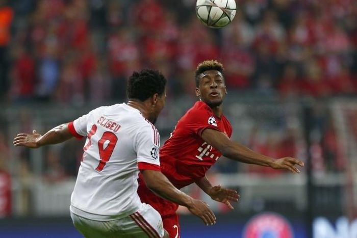 Bayern Munich's Kingsley Coman in action with Benfica's Eliseu