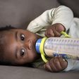 Baby feeding from a bottle