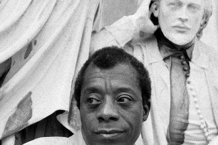 James Baldwin poses with Shakespeare