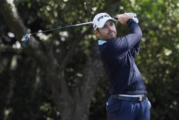 Louis Oosthuizen hits his tee shot on the 2nd hole during the third round of the 2016 The Masters golf tournament at Augusta National Golf Club.