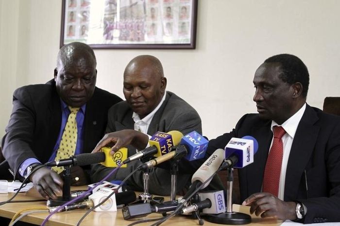 From L-R: David Okeyo, Athletics Kenya Secretary General, Kipchoge Keino, the chairman of the Kenyan Olympic Committee and Athletics Kenya Chairman Isaiah Kiplagat prepares to address a news conference in Kenya's capital Nairobi May 23, 2012. REUTERS/N...
