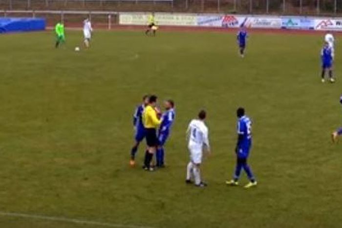 Referee headbutts player