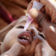 A newly arrived Somali refugee child receives a polio drop at the Ifo extension refugee camp in Dadaab, near the Kenya-Somalia border, August 1, 2011.   REUTERS/Thomas Mukoy