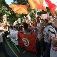 Tunisians demonstrate against a bill being discussed in parliament to grant amnesty to people accused of corruption on July 25, 2016