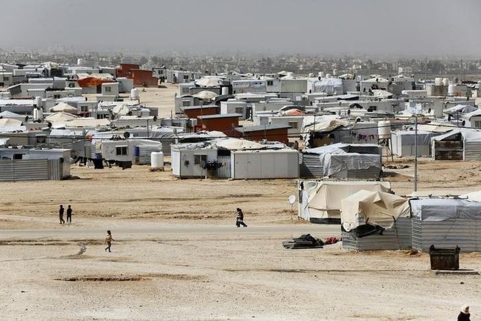 Syrian refugees are seen at the Al Zaatari refugee camp in the Jordanian city of Mafraq, near the border with Syria March 11, 2015. REUTERS/Muhammad Hamed