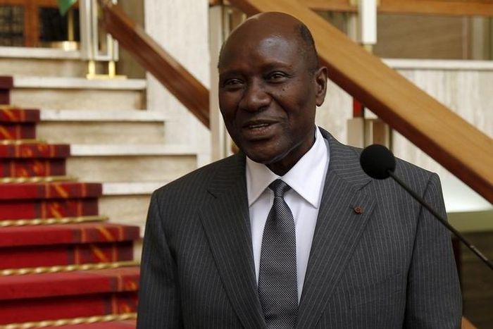 Ivory Coast Prime Minister Daniel Kablan Duncan smiles after the annoucement of the new government at the presidential palace in Abidjan January 12, 2016.  REUTERS/Luc Gnago
