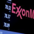 The logo of Exxon Mobil Corporation is shown on a monitor above the floor of the New York Stock Exchange in New York, December 30, 2015.