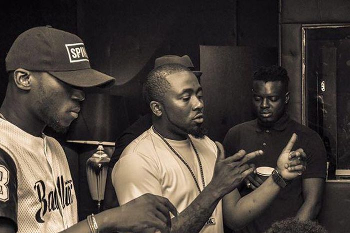 Ice Prince, DJ Spinall, Yung L recording in the studio.