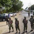 Nigerian army soldiers stand guard in Abuja June 25, 2014.