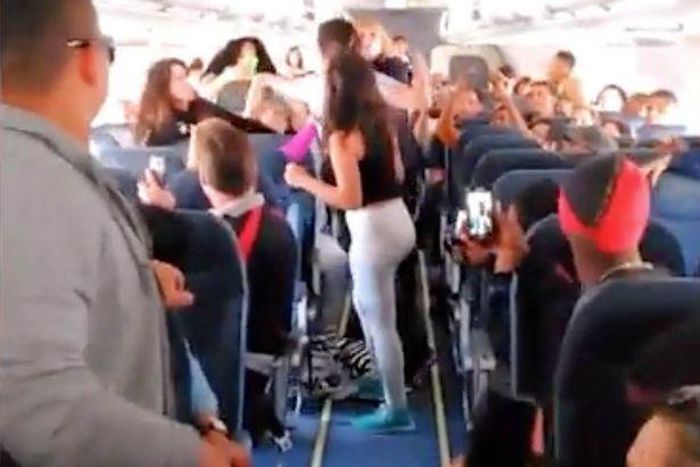 5 Female plane passengers filmed fighting viciously over 'loud music'