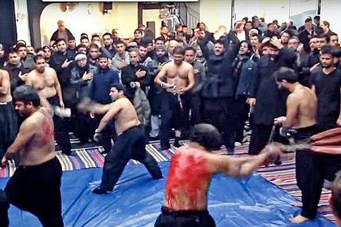 Images from a video showing men whip themselves