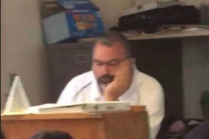 Teacher forgets to turn off projector while browsing for pants and bra during lesson