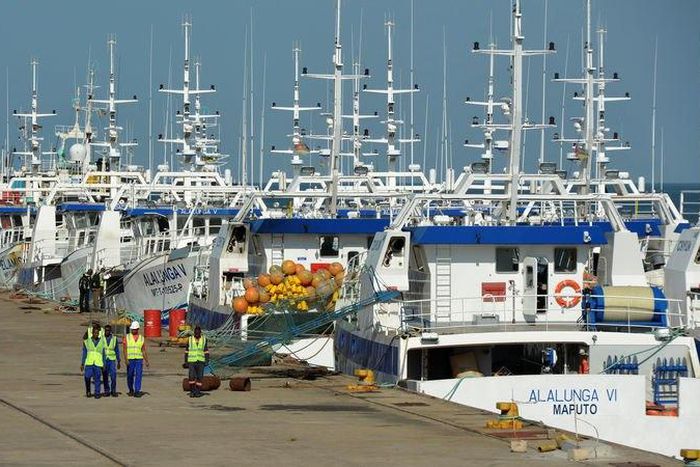 Security guards patrol past the EMATUM fishing fleet docked in Maputo, Mozambique, May 3, 2016. REUTERS/Grant Lee Neuenburg