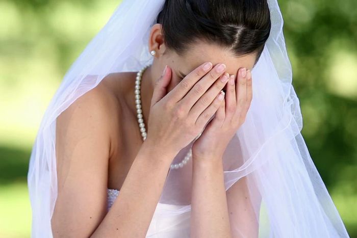 Bride crying on wedding day